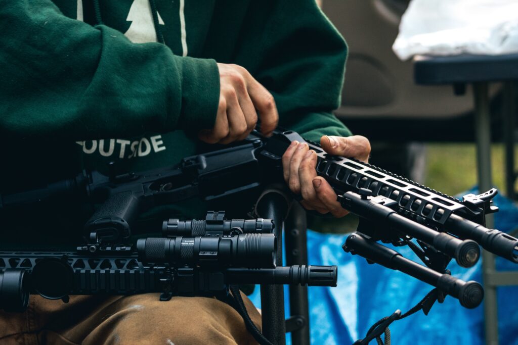 A man holding a gun in a Budapest shooting range.