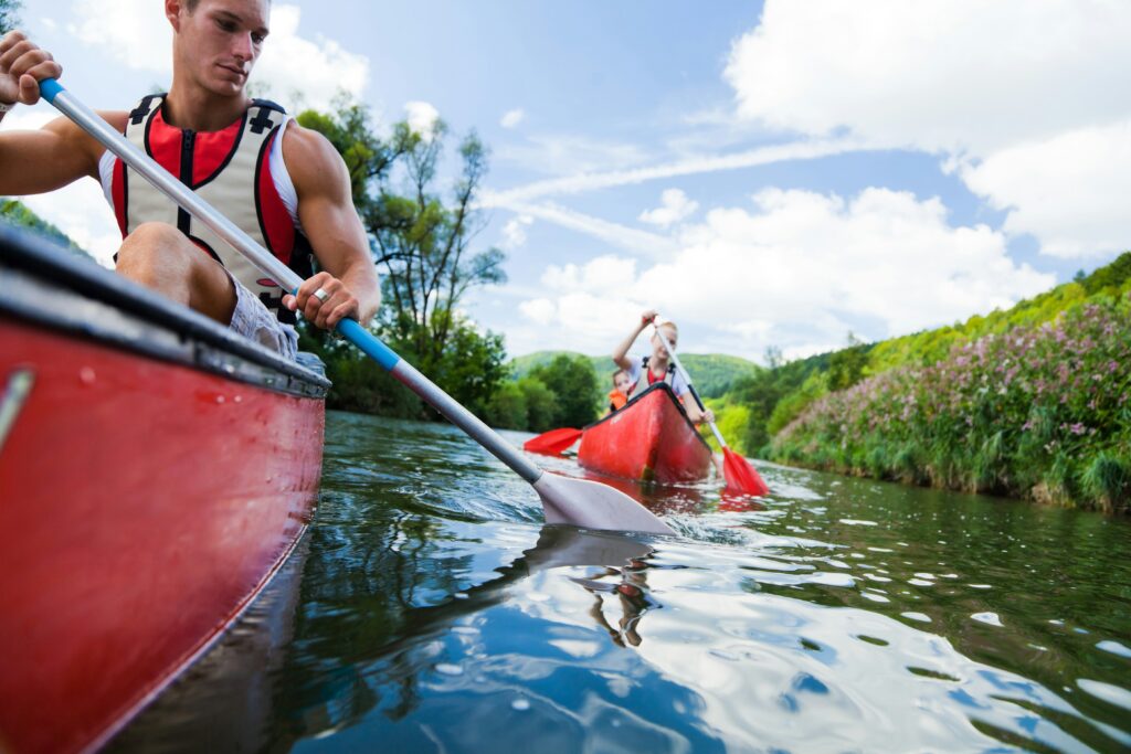 canoeing in River Danube with best friends during a stag do party in Budapest