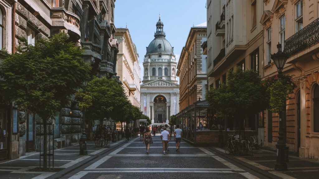 St. Stephen's Basilica in Budapest during the summer time with walking youngsters.