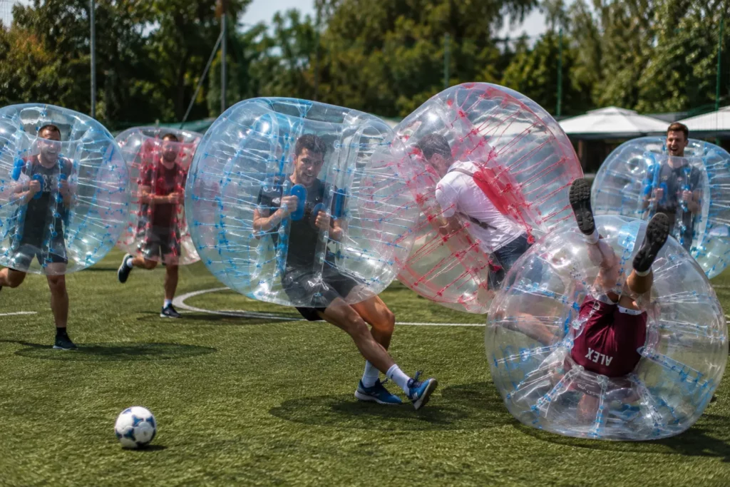 Bachelor party group playing bubble football in Budapest