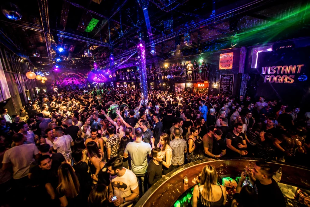 Crowded dance floor at a Budapest ruin bar complex