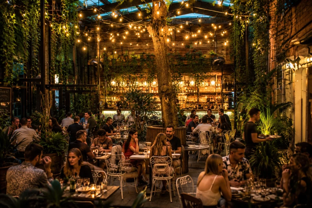 Green courtyard restaurant inspired by Budapest ruin bars