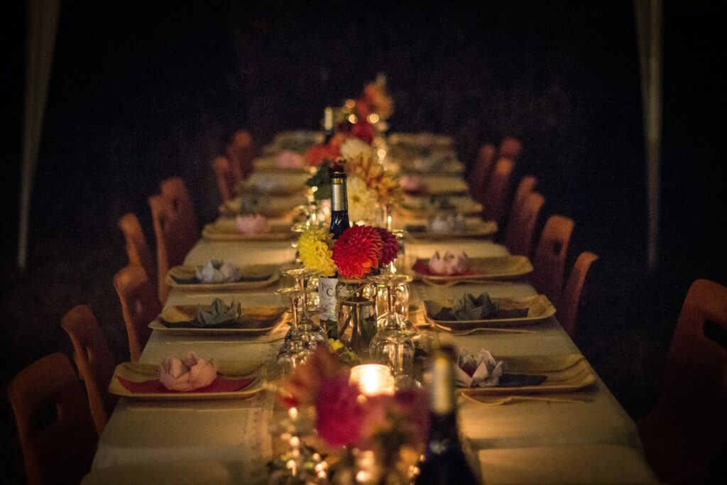 Elegant dinner table setup with flowers and wine, perfect for a stag do celebration in Budapest