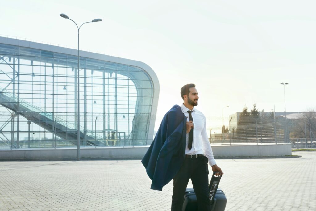 Stag do traveler arriving at Budapest Airport, ready for stylish and seamless stag do transfer Budapest services for the ultimate party weekend.