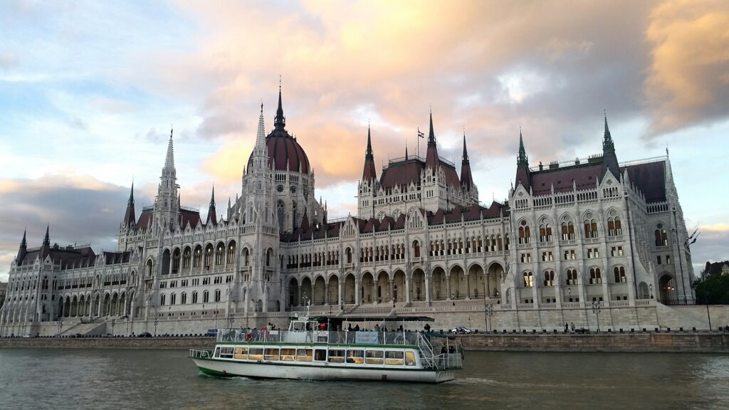 Elegant riverboat cruising past the iconic Hungarian Parliament in Budapest, perfect for a Private Riverboat Party on the Danube