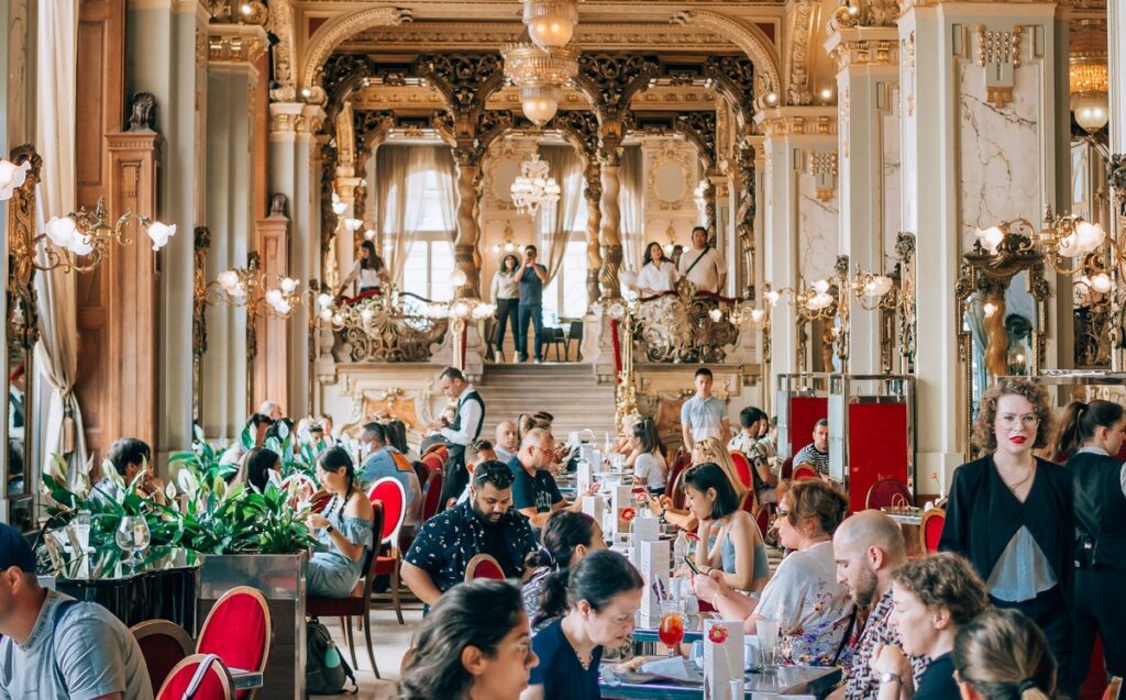 Elegant evening at Budapest's New York Café, a stunning blend of fine dining and nightlife in the city's historic heart.