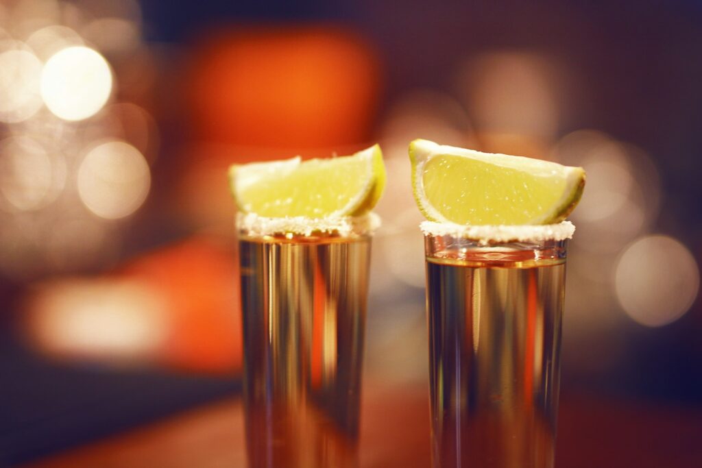 Tequila shots with lime wedges and salted rims, perfect for a Budapest stag adventure