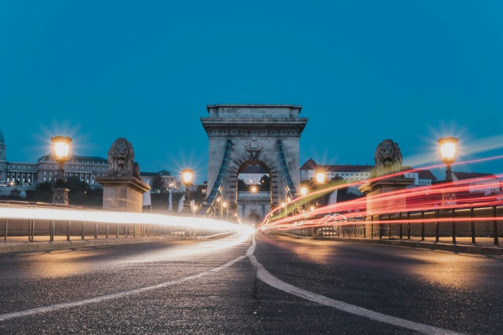 Evening view of Budapest's Chain Bridge with light trails, a stunning location for stag parties and perfect for Stag Do Accommodation Tips Budapest.