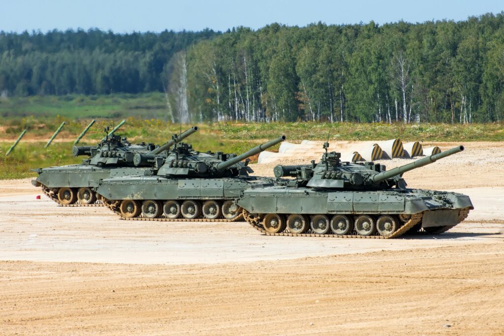 Row of tanks ready for an exhilarating tank driving experience, a unique and unforgettable activity for stag parties in Budapest