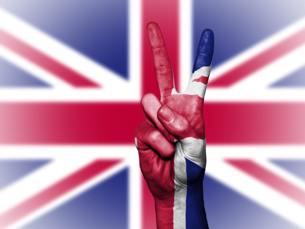 British flag-themed hand symbolizing expensive foreign companies, a common Budapest stag do red flag 