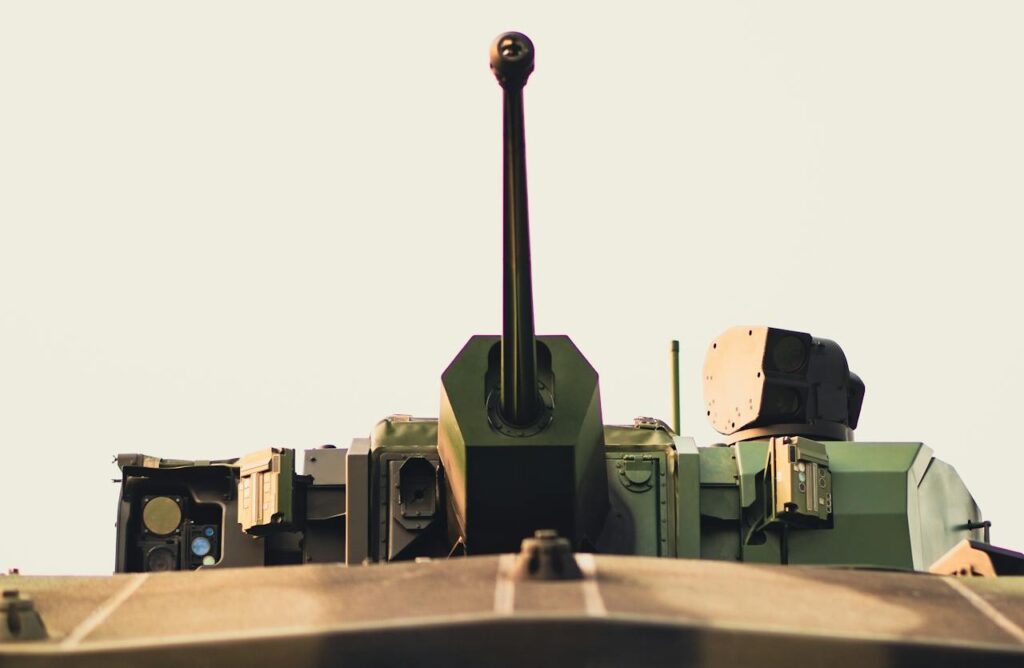 A close-up view of a tank's turret and cannon, highlighting its powerful design perfect for a thrilling stag activity like tank driving