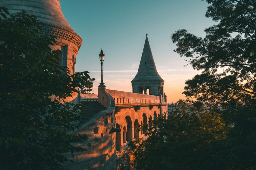 The iconic Fisherman's Bastion in Budapest during sunset, a serene location perfect for Outdoor Adventures Stag Budapest experiences