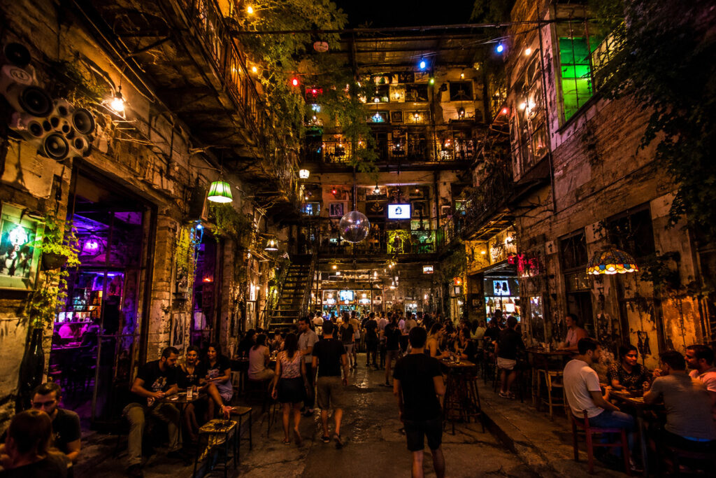 Lively ruin bar in Budapest at night